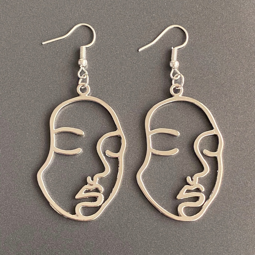 NEW Human Face Earrings in Silver color